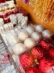 christmas decorations, store with Christmas toys, balloons on the shelves, Christmas tree, gnomes, 