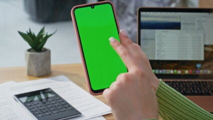 Finger tapping mockup cellphone turning on video call closeup. Woman using phone