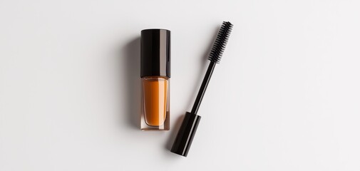 Obraz premium Brow gel tube with a brush applicator, the brush slightly pulled out, revealing the product, against a clean white backdrop