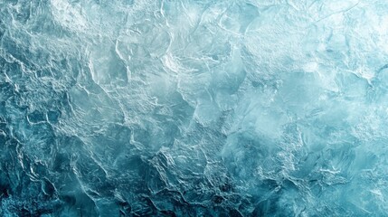 Obraz premium Frozen pattern on winter glass. Blue ice frost background, texture blue wallpaper. Crystals of snow on window surface. Screen overlay abstract design