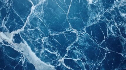 Fototapeta premium Close-up view of a blue marble surface with white veining.