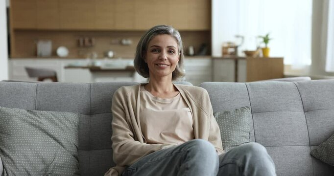 Group of happy different people looking at camera, multinational portraits, front view. Changing real-time footages representing human individuality, diversity and equality. Life, variety and unity