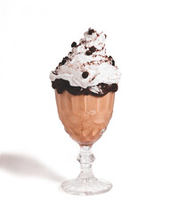 Coffee drink with cacao seeds, chocolate and chantilly on a white background.