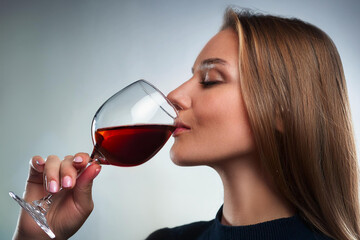 woman with glass of red wine