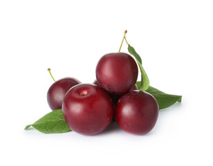 Ripe plums with leaves isolated on white