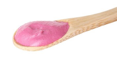 Tasty beetroot hummus in wooden spoon isolated on white