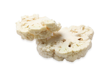 Two uncooked cauliflower steaks isolated on white