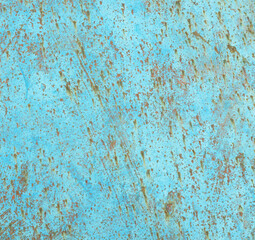 Rusty blue scratched metal background looks like abstract art. Rust on iron copy space backdrop