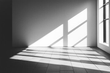 Fototapeta premium Sunlight through window casting geometric shadows on tiled floor in minimalist room