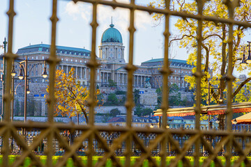 Buda Castle in shadow, fence in foreground, backlight, Hungary, Budapest, telephoto lens