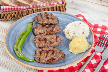 Turkish Cuisine Grilled Meatballs. Turkish meatball traditional kofte. Spicy meatballs Kebab or...