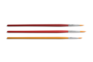 Set of various size paintbrushes isolated on a transparent background, PNG. High resolution.