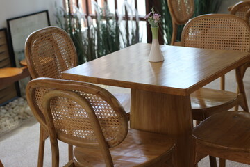table and chairs in the background.