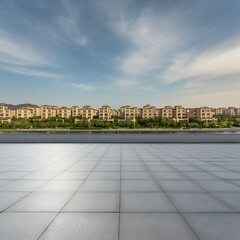 Obraz premium Modern city skyline at sunset with skyscrapers reflecting golden sunlight, spacious tiled floor, and metal railing in the foreground, perfect for urban lifestyle, travel, and architecture content.