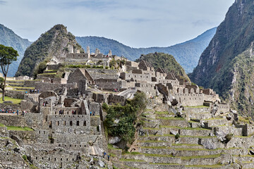 Machu Picchu is a 15th-century Inca citadel located in the Andes Mountains of Peru, near the city...