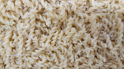Close-up of raw fusilli pasta