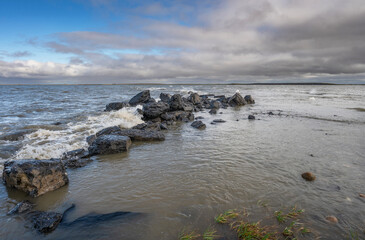 Water breaking on rocks in the Arctic Ocean at Tuktoyaktuk, Northwest Territories, Canada
