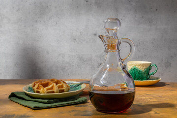 Maple Syrup in a Glass Jar with waffle