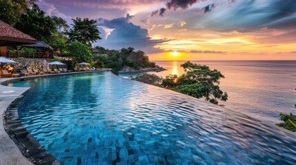 Obraz premium Serene Sunset Over Infinity Pool by the Ocean