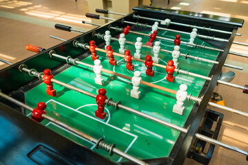 Tabletop Soccer Excitement - Close-Up of Foosball Game