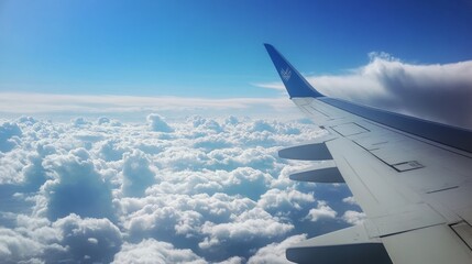 Obraz premium Cloud formations and sky from airplane