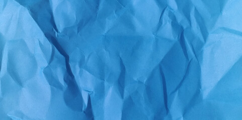 Torn piece of irregular crumpled paper vector. Colorful blue crumpled paper texture.