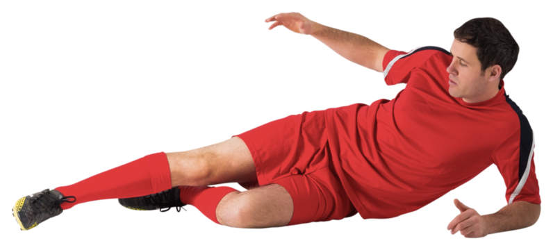 Football player in red kicking