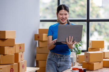 Entrepreneur startup SME business asian woman holding laptop. Small Online Business Online...