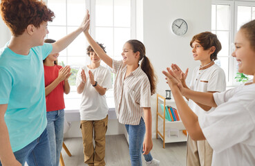 School friendship children unity, young student friends and classmates girls and boys high five...