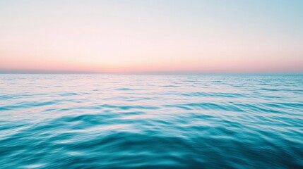 Fototapeta premium Serene Sunset Seascape: Tranquil Waves Glimmer in Pastel Hues