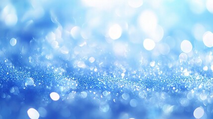 Obraz premium Soft Blue Bokeh Background with Sparkling Effect