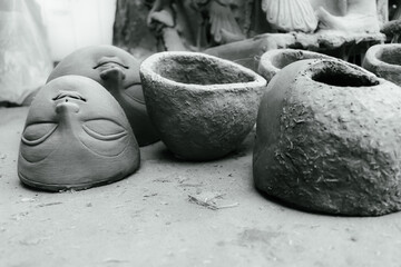 Close-up of goddess durga's head sculpted in clay