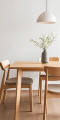 Japandistyle dining room with a wooden table, minimalist chairs, and soft lighting for a calming atmosphere   wood table, minimalist chairs, calming dining room