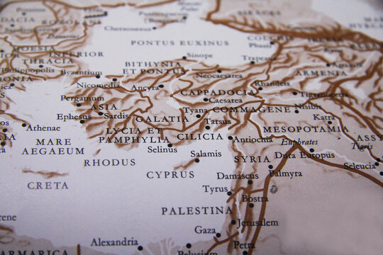 A vintage map of ancient regions including Asia Minor, Mesopotamia, and parts of the Mediterranean, showcasing cities and historical territories like Galatia, Syria, and Cyprus in classical Latin