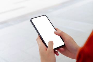 Hand holding smartphone mockup of blank screen, Take your screen to put on advertising.