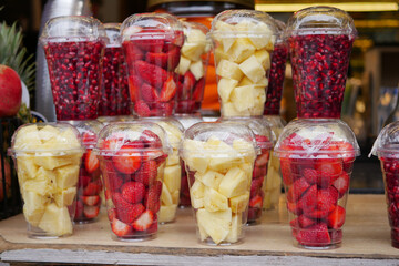  Ripe Red Strawberries in. plastic container selling at shop 