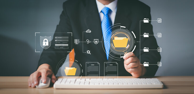 Document Management System (DMS), Businessman using digital documents to search, store, archive and manage and to reduce paper. Solution for paperless office. Digital business security process.