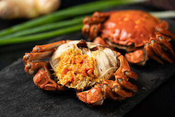 steamed hairy crab meat on table.