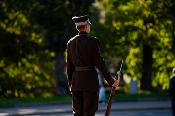 Obraz premium Latvian national guard standing in peace guard in Riga next to Freedom Monument