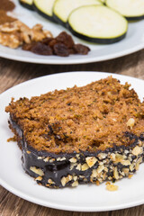 Pieces of zucchini dough with nuts and raisins. Delicious dessert