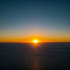 Fototapeta premium sunset over the ocean. sunset over the field. golden hour photography. sunrise over the mountain land.
