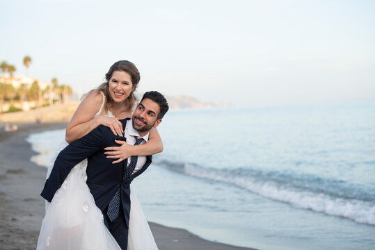 Photos of a newlywed couple on the Spanish coast, Nerja, Malaga.