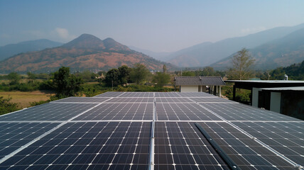 Beautifully installed solar panel array on a rooftop in a remote area, harnessing natural energy from the sun, symbolizing sustainable living and the use of renewable resources.