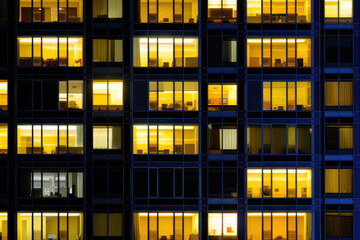 Glowing Office Windows in Dark Urban Night
