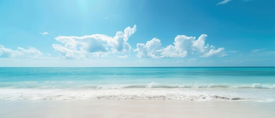 Obraz premium Serene Tropical Beach with a Clear Blue Sky