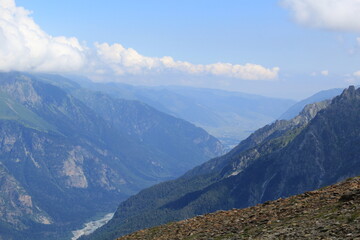 Naklejka premium mountain landscape with clouds