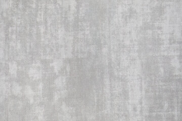 Texture of fabric wallpaper on the wall