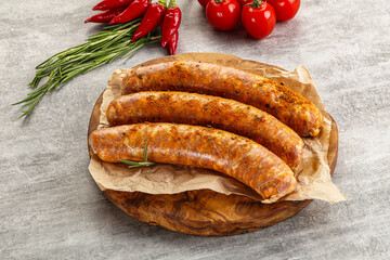 Raw sausages with spices and herbs