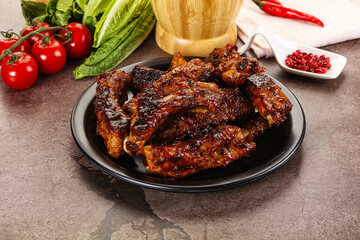 Grilled pork ribs in barbecue sauce