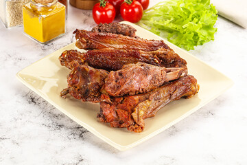 Roasted duck wings with sauce
